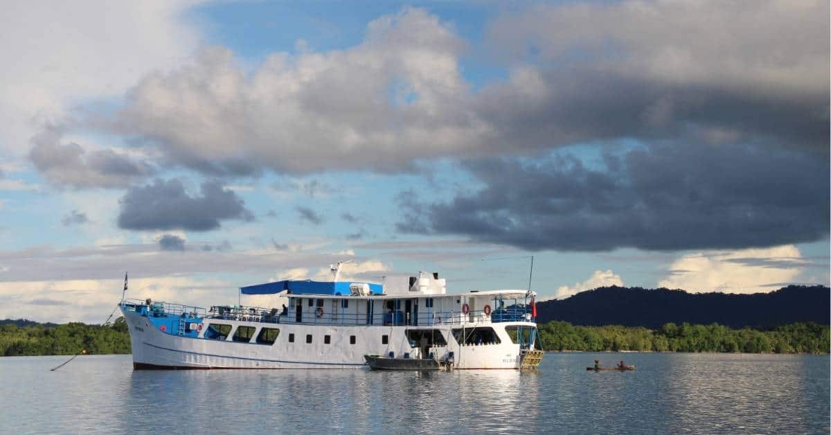 Large liveaboard vessel anchored in Solomon islands